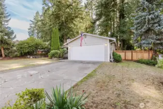 The big trees in the back are part of the community green belt that separates the properties to the south.