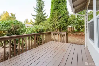Front deck area has room for a barbeque and chairs.