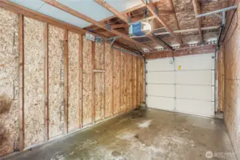 One car garage directly across from condo unit!
