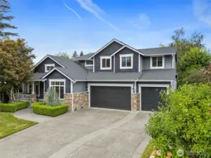 3-car garage and large driveway offers ample parking space