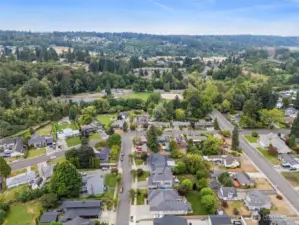 Aerial view looking toward Clarks Creek Park North. Park features baseball/softball diamond, tennis/pickle ball courts and trails.
