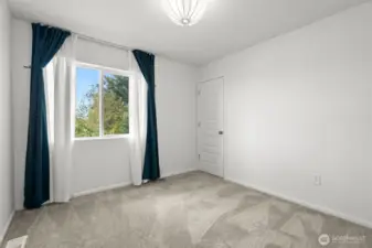 Bedroom #3 located on the third level.