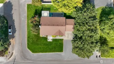 Wide driveway and 3-car garage offer ample parking and storage.