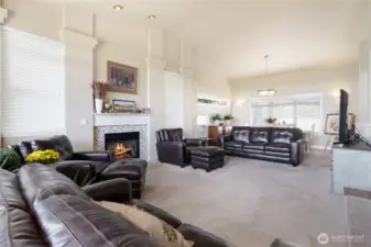 Open-concept living room with natural light and modern design