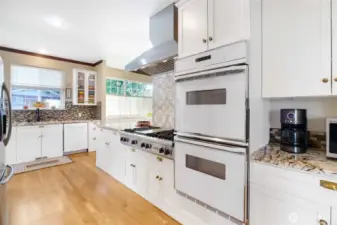 Layout connects kitchen, dining, and living spaces seamlessly