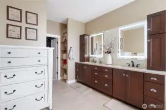 Spa-inspired en suite with double vanity and granite counters