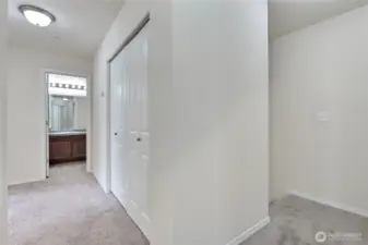 Landing at top of stairs has a storage closet.