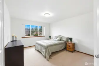 Huge bedroom at the top of the stairs.