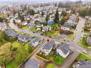 Just across the street is a neighborhood park with large sport court.