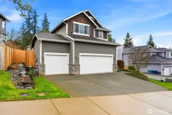 Three car garage and lots of storage shelves complete this package. Don't miss your opportunity to see this special home before it's gone!