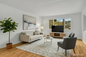 With plenty of natural light and a open concept feel- this living room is warm and inviting and the place you will want to spend time in! *Virtually staged