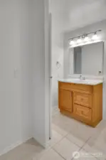 View of primary bath from primary bedroom.