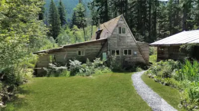 A-framed home, garage on right