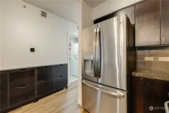 Special hallway storage is perfect for shoes, mail.