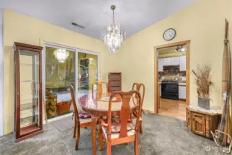 Dining Room with View of Backyard Retreat