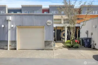 Charming entrance w/ private garage