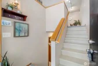 Split entry w/ durable flooring on stairs
