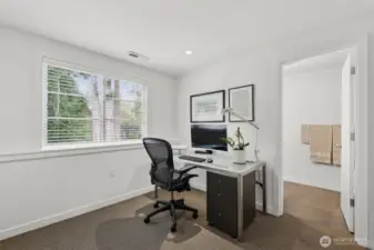 En suite office with closet and bath