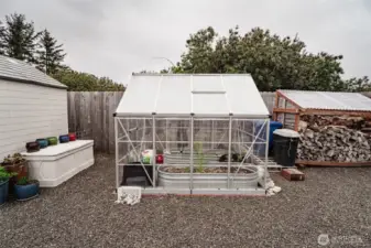 A greenhouse for flowers, veggies, herbs, etc.