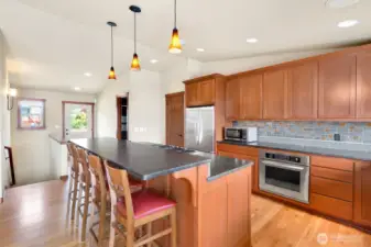 Custom kitchen with lots of seating at counter top