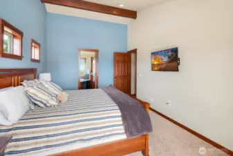 Large primary bedroom with deck access