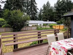 12'x20' deck off the dining room overlooking the fenced back yard. Large, Shy 1/4 acre lot with fenced back yard. #2407 Elliott Ave NW, Olympia, WA 98502