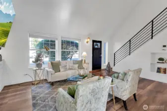 Large windows flood the home with natural light.