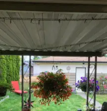 Nice covered patio! You can BBQ all winter long!