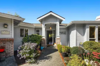 This daylight rambler with a main floor primary suite is truly a one of a kind opportunity on Finn Hill