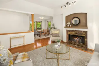 This room has high ceilings and picture window that overlooks the front garden.