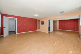 Huge basement, was being used as a dance floor with mirrors.