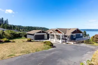Large driveway with RV parking space as well as dble gate for yard access