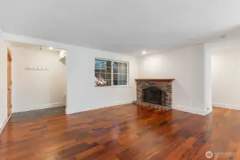 Unit entry, coat area and living room