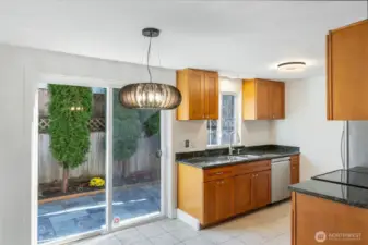 Eat-in kitchen area with access to spacious back patio