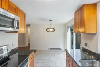 View towards eating area, living room and hallway to sleeping quarters