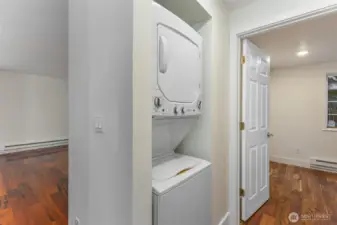 Laundry in hallway, looking towards 2nd bedroom