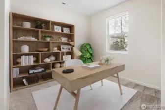 A quiet, sunlit office by the entry — perfect for focused work, homework sessions (Virtually Staged)