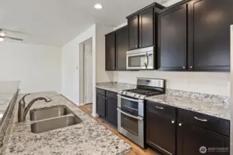 Plenty of cabinets and expansive countertops for all your cooking needs