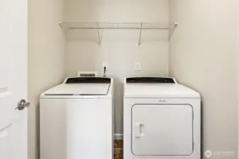 Laundry room with additional storage