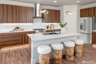 Gas cooking range with hood vent (model home lot 1A, colors may vary)