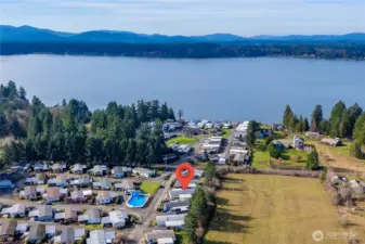 Enjoy the best of seaside living in this waterfront 55+ community with Puget Sound just moments away, including access to the community’s private beach for peaceful strolls and breathtaking views.