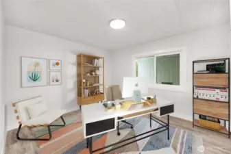 Third bedroom offers flexibility and comfort—perfect for guests, office, a hobby room, or additional living space.   (photo virtually staged)