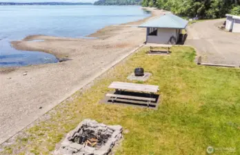 Private beach access with picnic area, fire pit & cabana creates the ultimate waterfront retreat just steps from home.