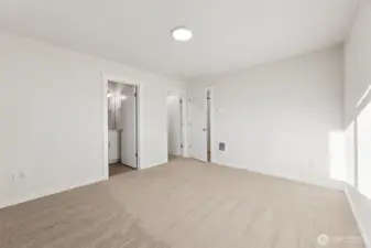 Primary bedroom with separate bath and walk in closet