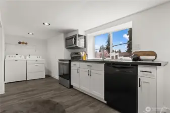 Basement kitchen and laundry room