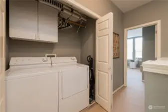 Laundry area provides separation between the suites.