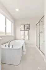 *Optional soaking tub* Pictures of same floorplan at different site. Specs/finishes differ.