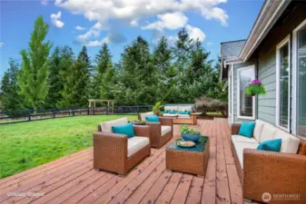 Primary features sliding door out to expansive deck.