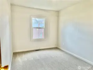 Bedroom #1 with built in closet and drawers.