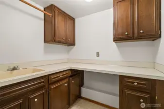 Laundry room with sink.